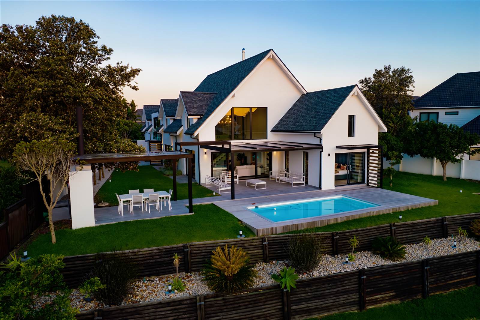 Contemporary home and pool photographed at dusk by Media Fans